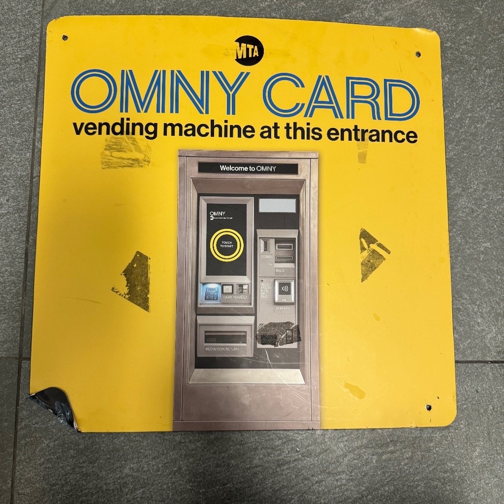 Authentic MTA Signage announcing the use of the OMNY
